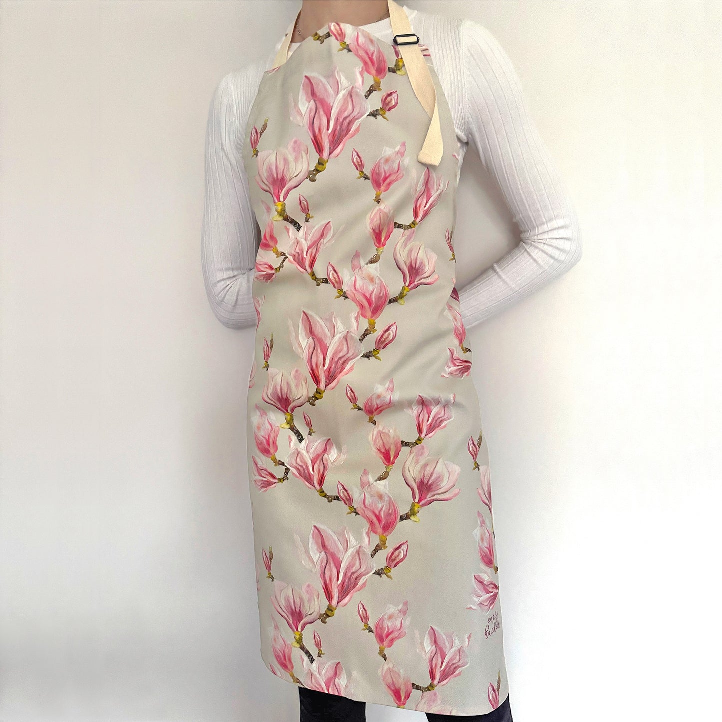 Model wearing magnolia adult apron