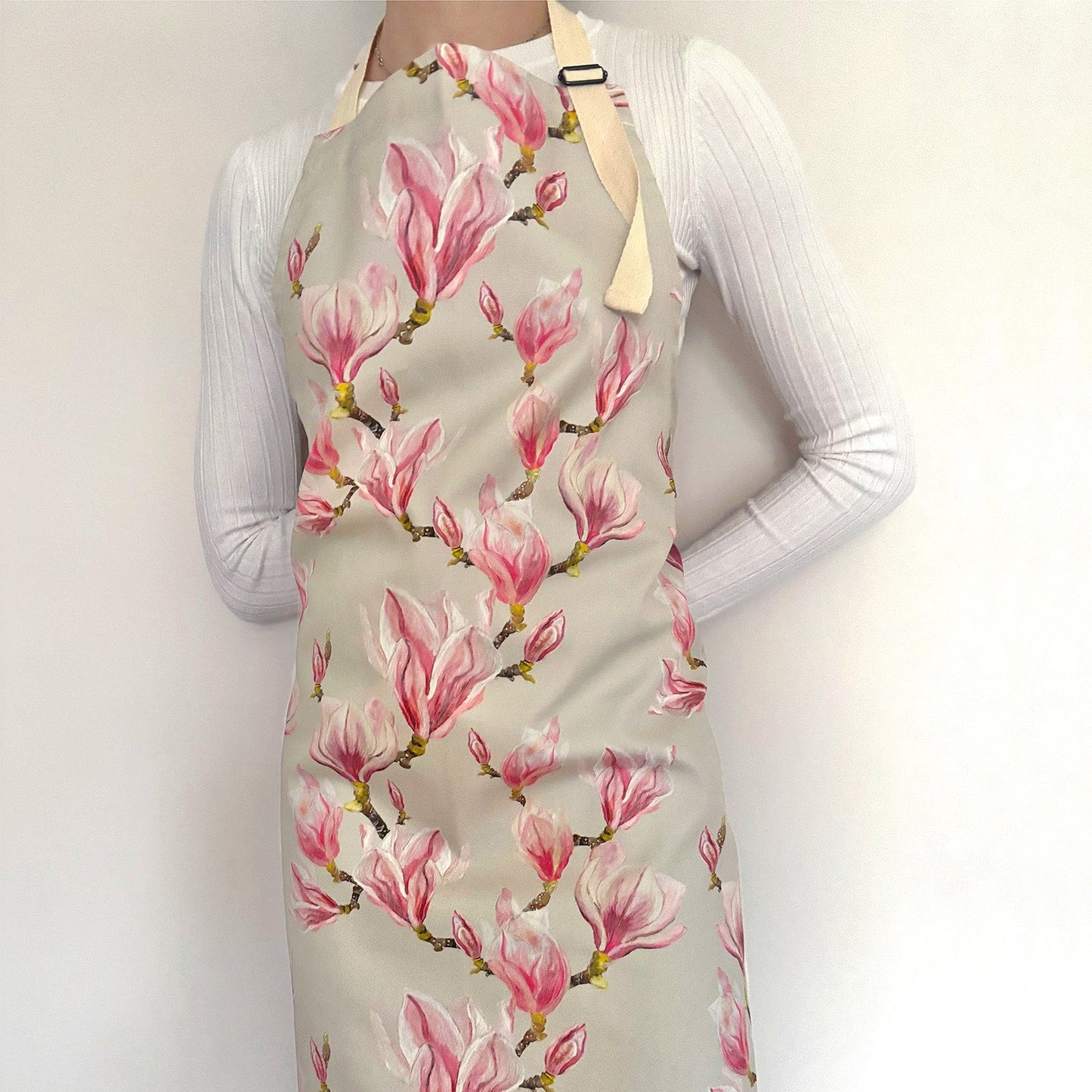 Model wearing magnolia adult apron