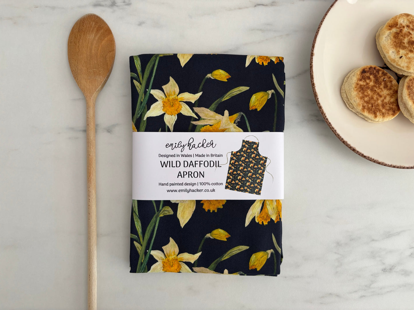 Folded daffodil apron in product belly band