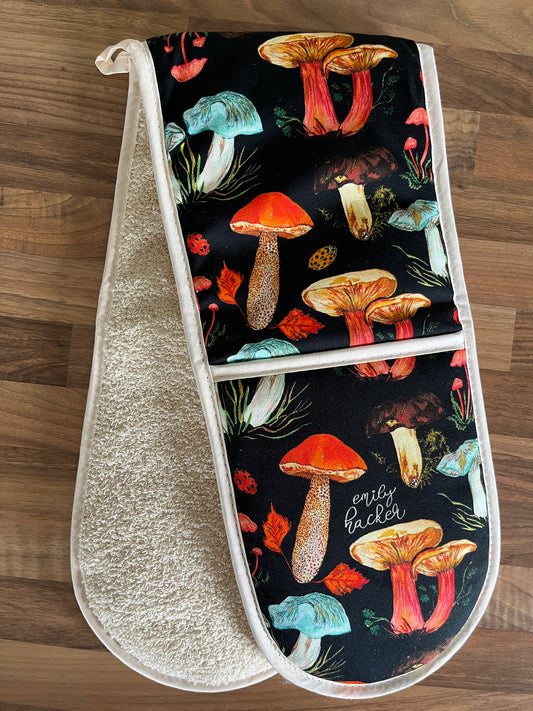 Mushroom double oven glove on wooden worktop