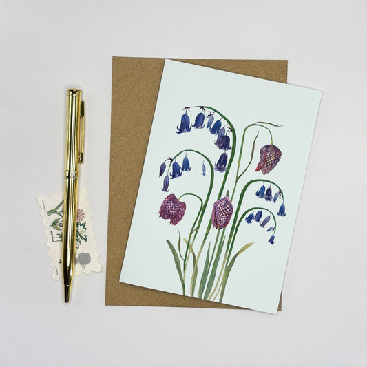 Native bluebell Greeting card with wildflower floral snake head fritillary design on a white background
