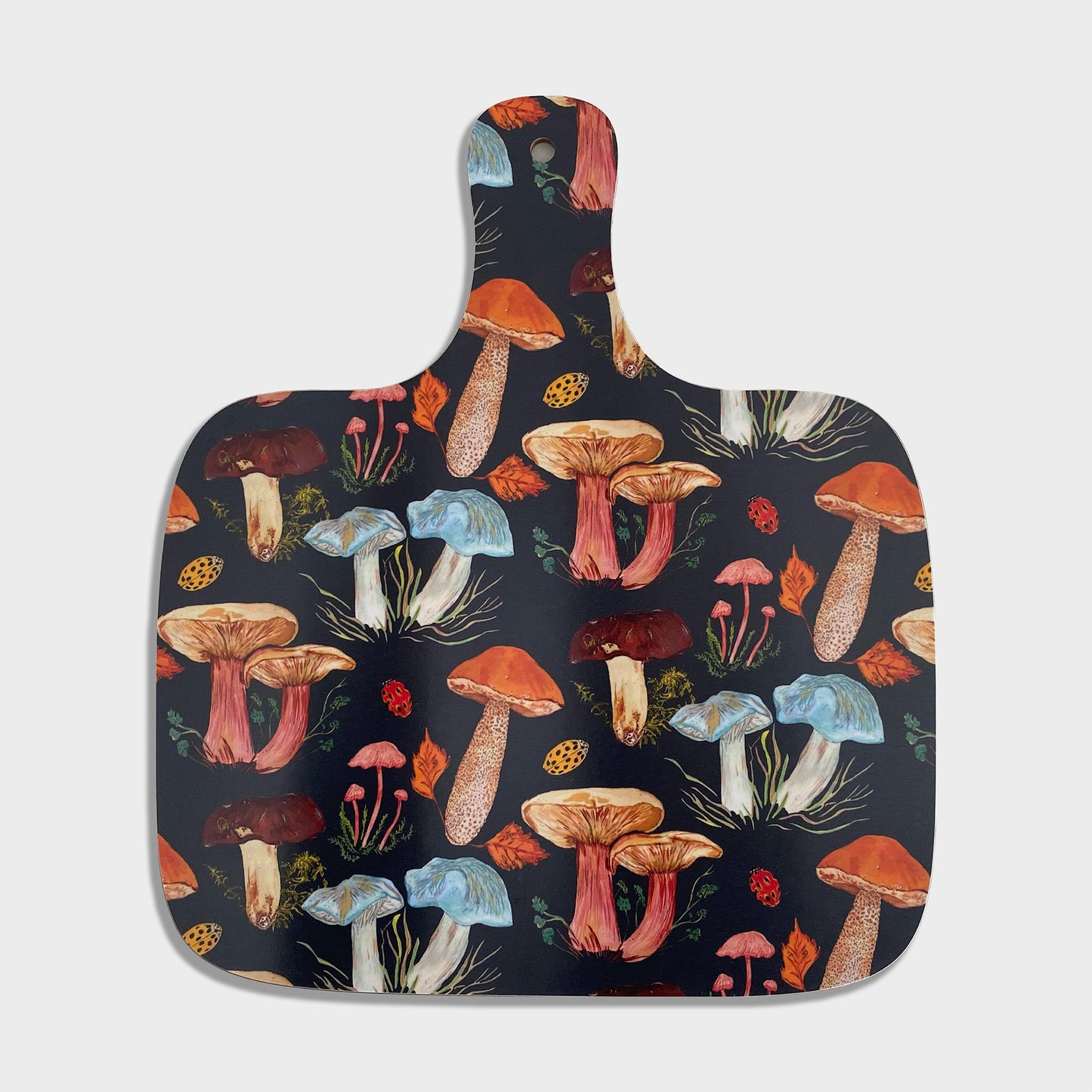 A medium-sized dark blue chopping board with a hand painted mushroom pattern, including various colors and species of mushrooms.