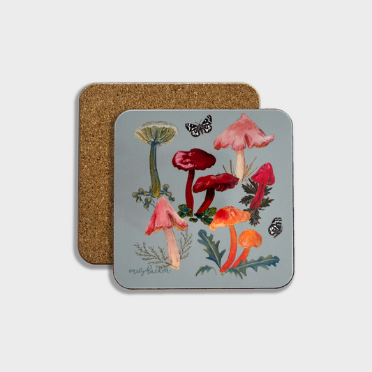 A square coaster with a light blue background featuring colorful illustrations of waxcap mushrooms and a wood tiger moth, accompanied by its cork backing.