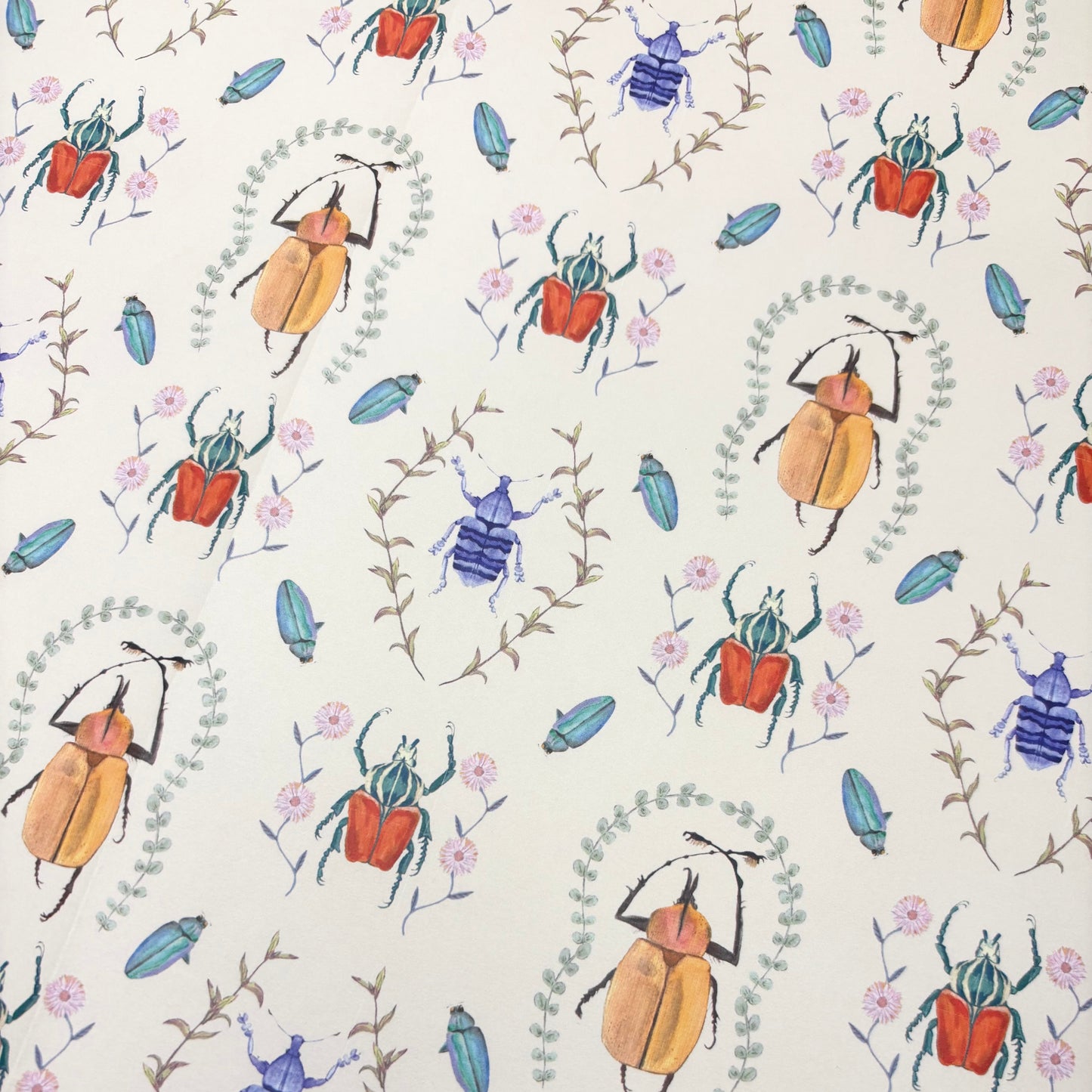 Patterned beetle and floral wrapping paper with colorful beetles and flowers on a white background