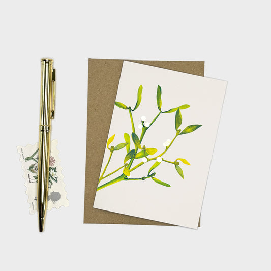 Hand illustrated bright green mistletoe and berries on a7 mini card