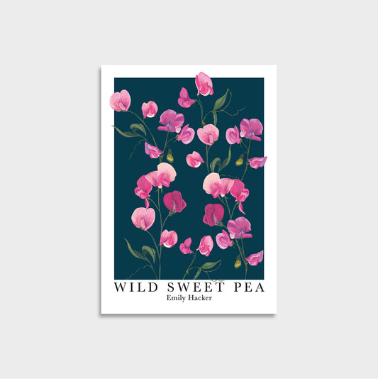 A mini art print poster titled 'WILD SWEET PEA' by Emily Hacker, featuring a watercolor illustration of pink sweet pea flowers on a dark navy background with a white border, shown against a light gray background.