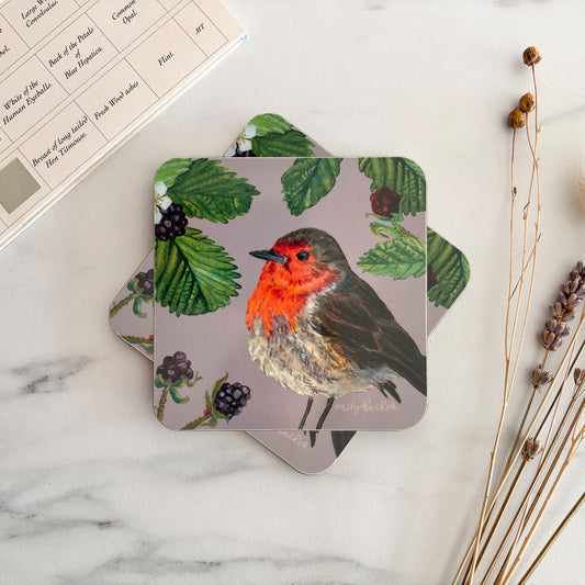 Robin Coaster with a hand painted robin design on a marble surface