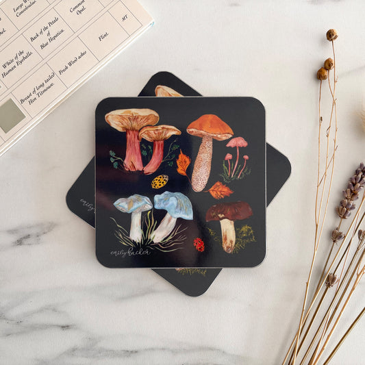 Mushroom Coaster with colorful hand illustrated mushroom illustrations on a marble surface.